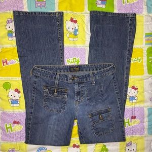 Cute y2k low rise flared jeans with unique designs and useable pockets